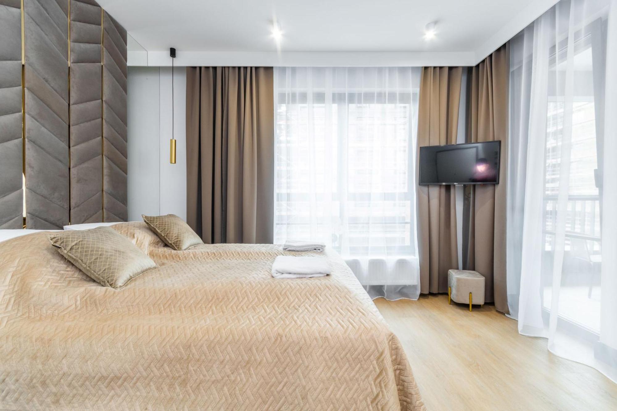 Grand - Doki Living & Foodhall Apartament *