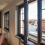 By The River Apartments