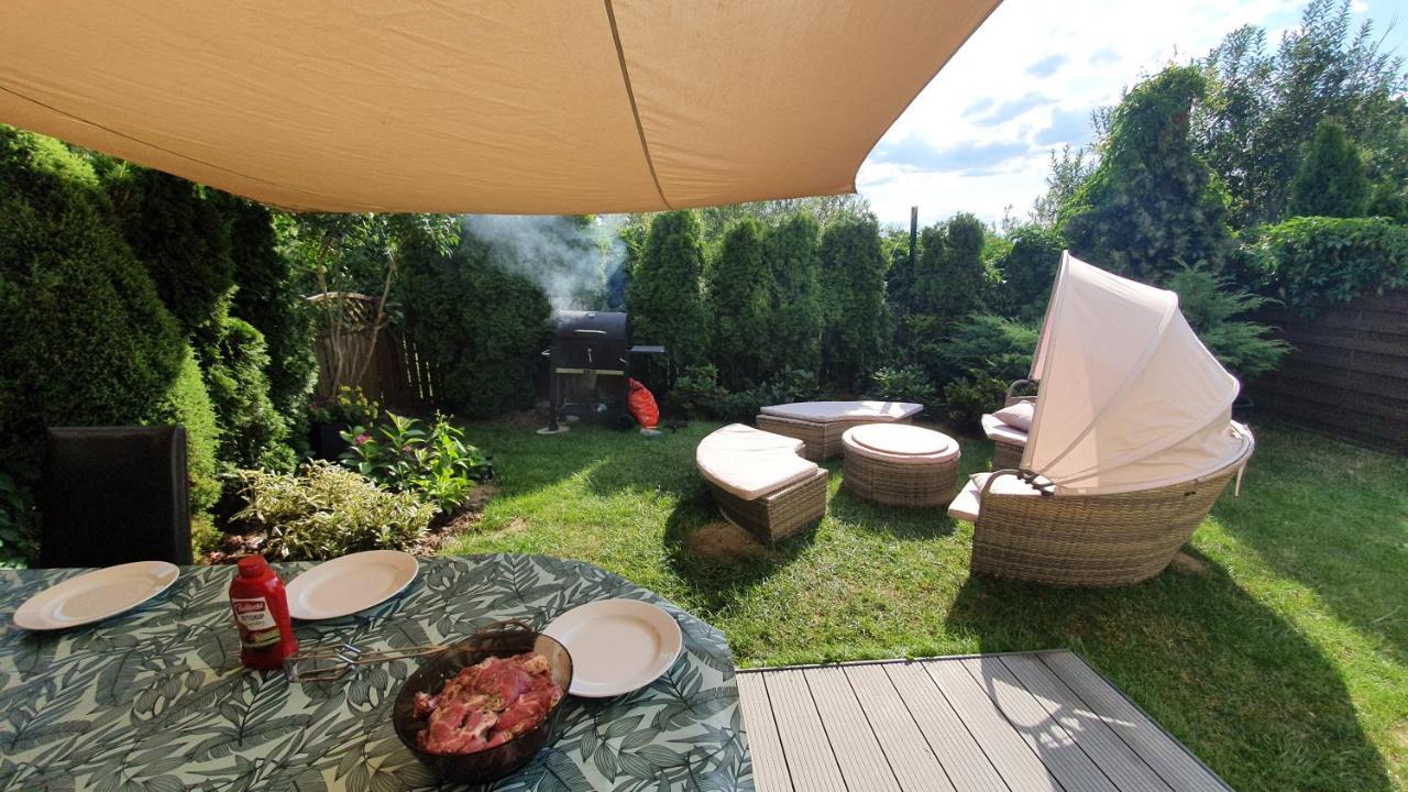 Apartament z ogrodem i grillem. *