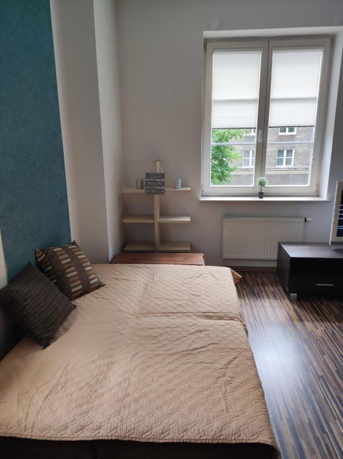 Przy Fontannie Neptuna Apartment
