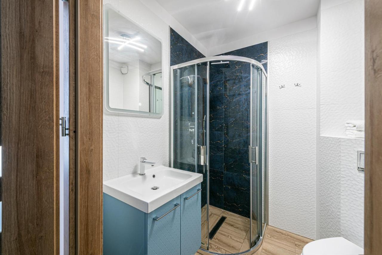 Niebieski Optilocus Apartment